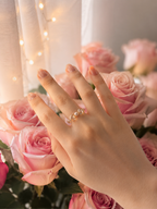 pinkish bow ring